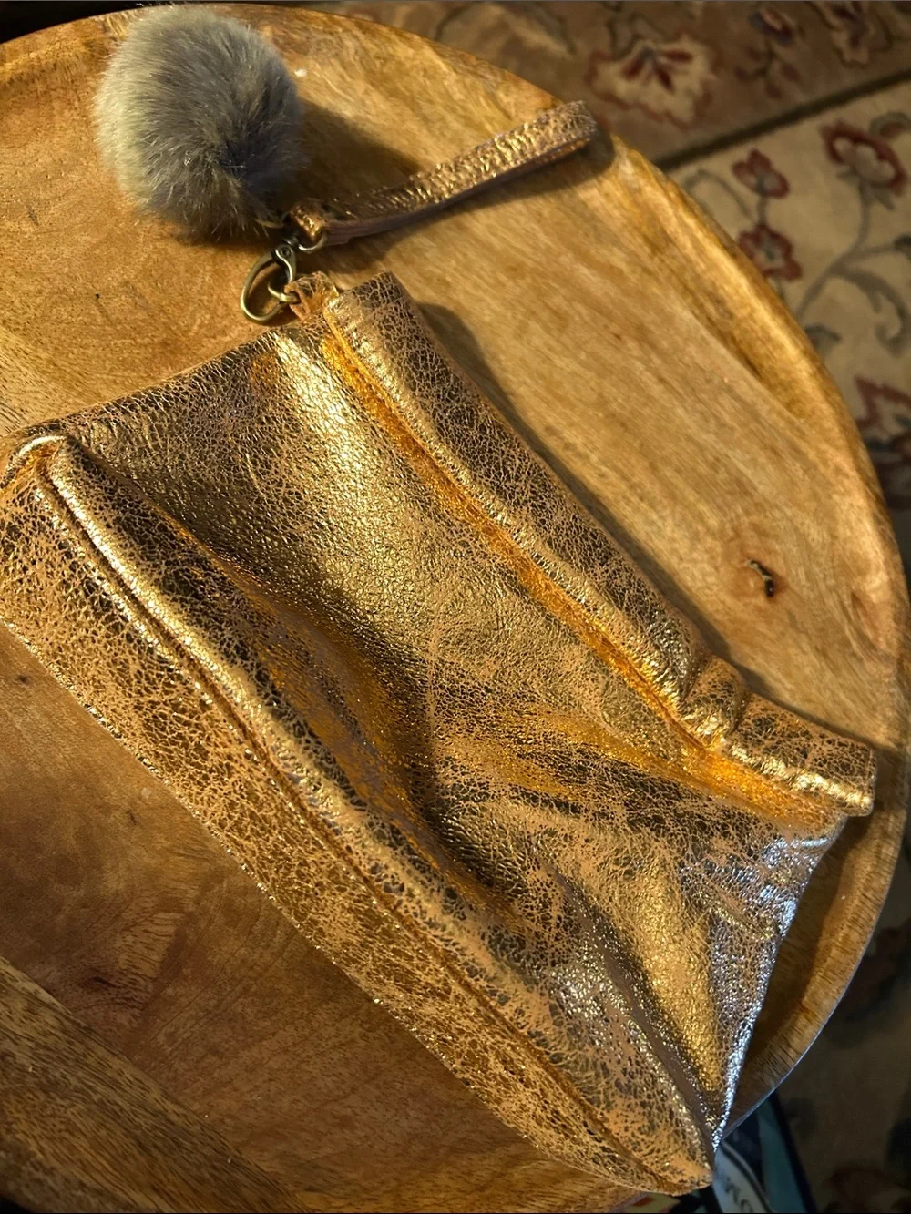 Miss Albright Metallic Bronze Zip Wristlet with Pom Pom Charm